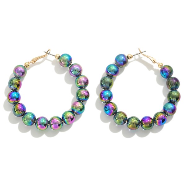 Circular Abalone Beaded Drop Hoop Earrings

- Approximately 2" L