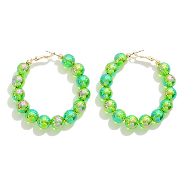 Circular Abalone Beaded Drop Hoop Earrings

- Approximately 2" L