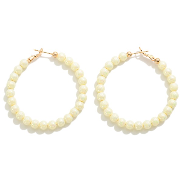 Beaded Pearlescent Drop Hoop Earrings

- Approximately 2" L  