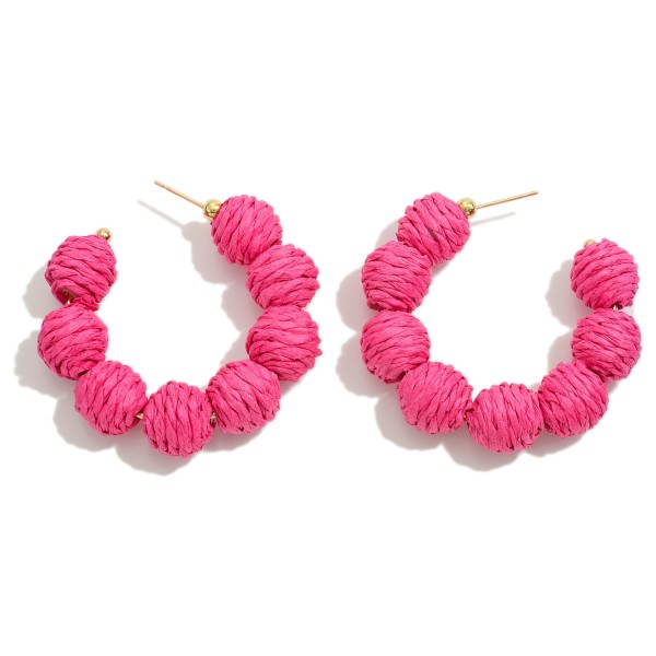 Circular Raffia Wrapped Beaded Drop Hoop

- Approximately 1.75" L 