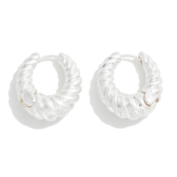 Metal Hinged Croissant Huggie Hoop Earring

- Approximately 0.75" L 