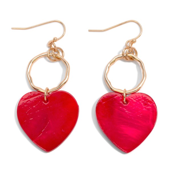 Gold Tone Drop Earrings Featuring Pearlescent Heart Pendant  

- Approximately 2" L