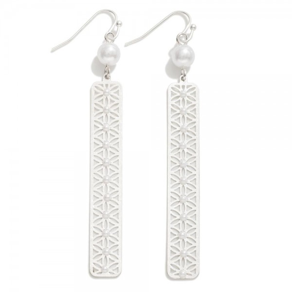 Metal Tone Geometric Laser Cut Drop Earrings With Pearl Accents 

- Approximately 3" L

