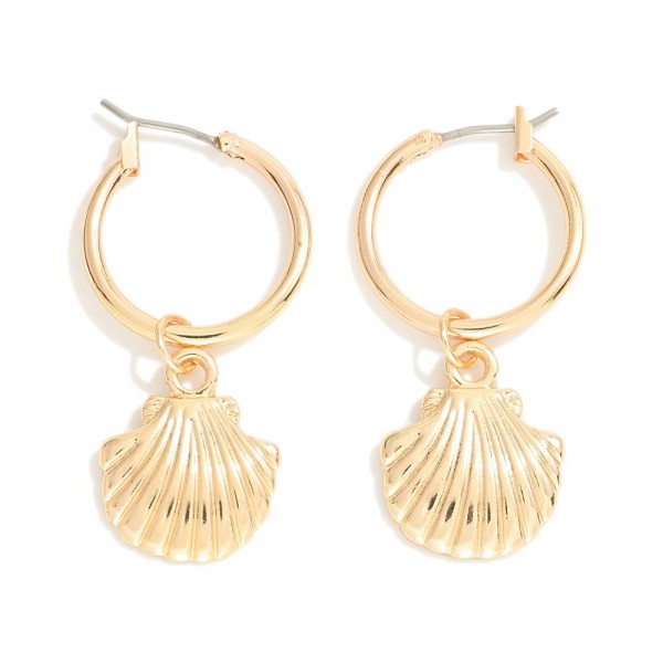 Metal Hoop Earrings Featuring Shell Pendant 

- Approximately 1.5" L
- Hoop .75" D