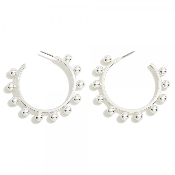 Metal Hoop Earrings With Studded Border

- Approximately 1.5" D