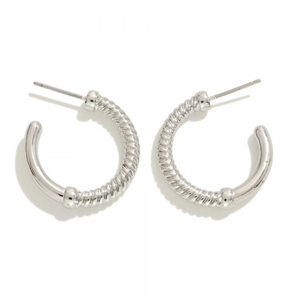 Twisted Metal Hoop Earrings

- Approximately .75" L