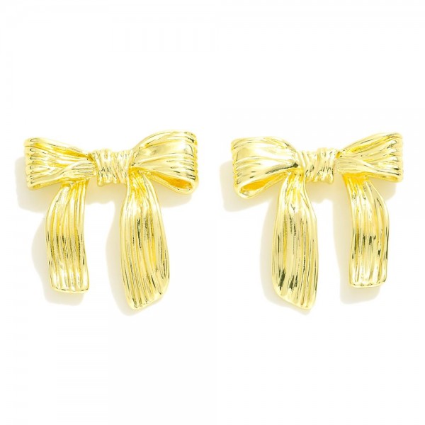 Textured Metal Tone Bow Earrings 

- Approximately .75" L