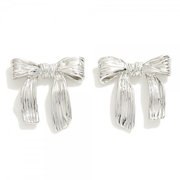 Textured Metal Tone Bow Earrings 

- Approximately .75" L