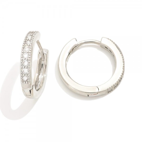 Do Everything In Love Cubic Zirconia Hoop Earrings

- Brass Base
- Hypoallergenic
- White / 14K Gold Dipped
- Made In Korea
- Approximately .75" D