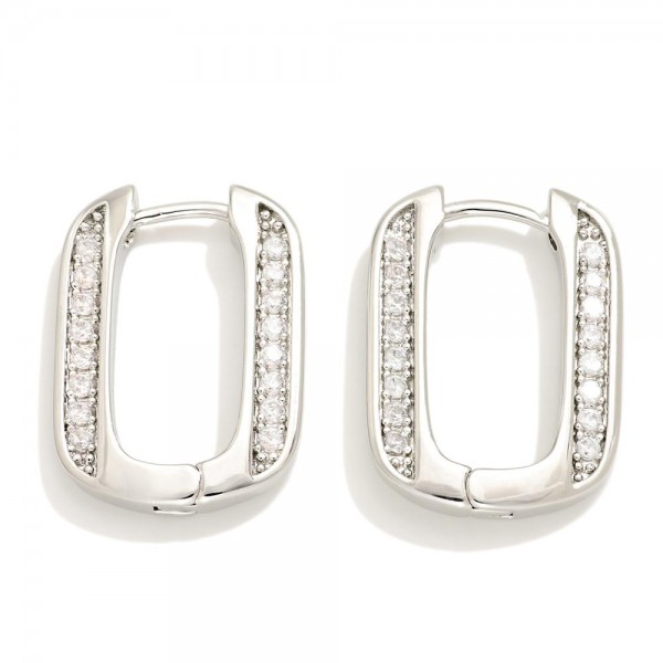 Do Everything In Love Cubic Zirconia Rounded Rectangle Huggie Hoop Earrings

- Brass Base
- Hypoallergenic
- White / 14K Gold Dipped
- Made In Korea
- Approximately .25" D