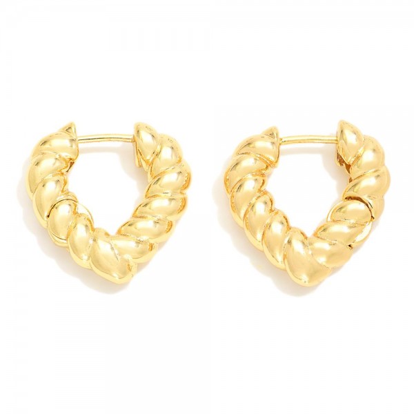 Do Everything In Love Twisted Metal Heart Earrings

- Brass Base
- Hypoallergenic
- White / 14K Gold Dipped
- Made In Korea
- Approximately .5" D