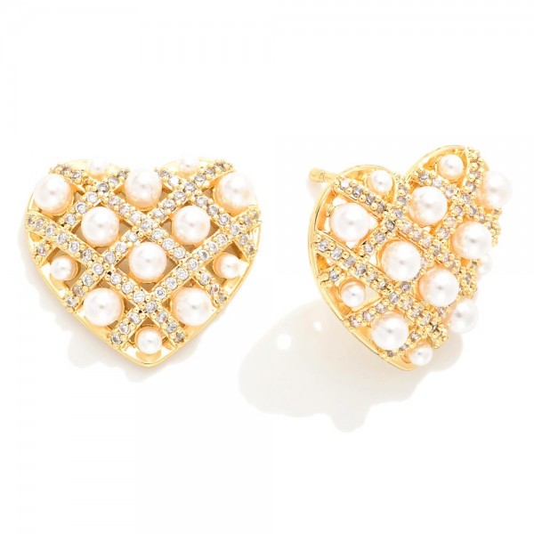 Do Everything In Love Pearl and Cubic Zirconia Studded Heart Earrings

- Brass Base
- Hypoallergenic
- White / 14K Gold Dipped
- Made In Korea
- Approximately 0.75"L