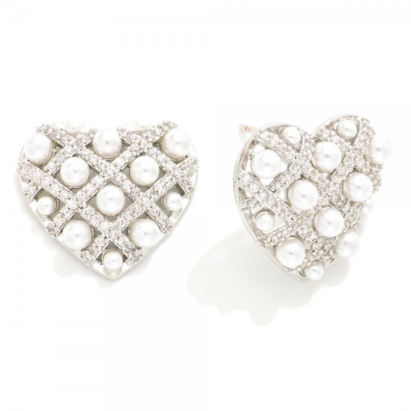 Do Everything In Love Pearl and Cubic Zirconia Studded Heart Earrings

- Brass Base
- Hypoallergenic
- White / 14K Gold Dipped
- Made In Korea
- Approximately 0.75"L