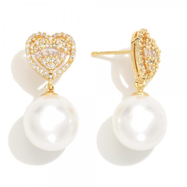 Do Everything In Love Cubic Zirconia Heart Post Drop Earrings featuring Pearl Accent 

- Brass Base
- Hypoallergenic
- White / 14K Gold Dipped
- Made In Korea
- Approximately 1" L