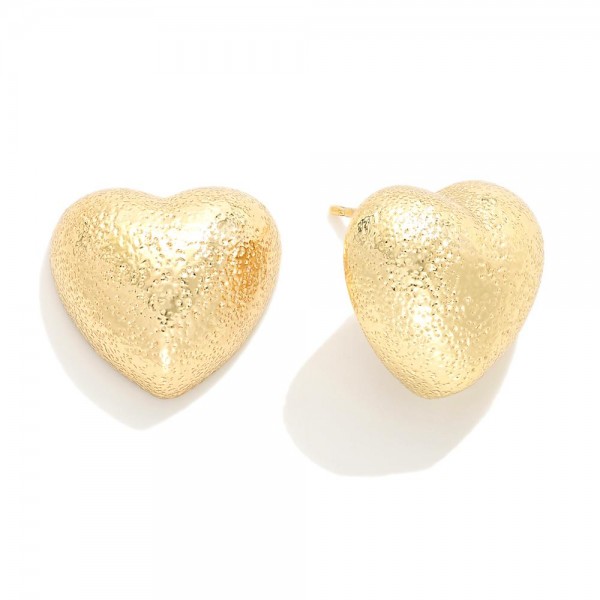 Do Everything In Love Dimpled Heart Stud Earrings

- Brass Base
- Hypoallergenic
- White / 14K Gold Dipped
- Made In Korea
- Approximately 0.75"L