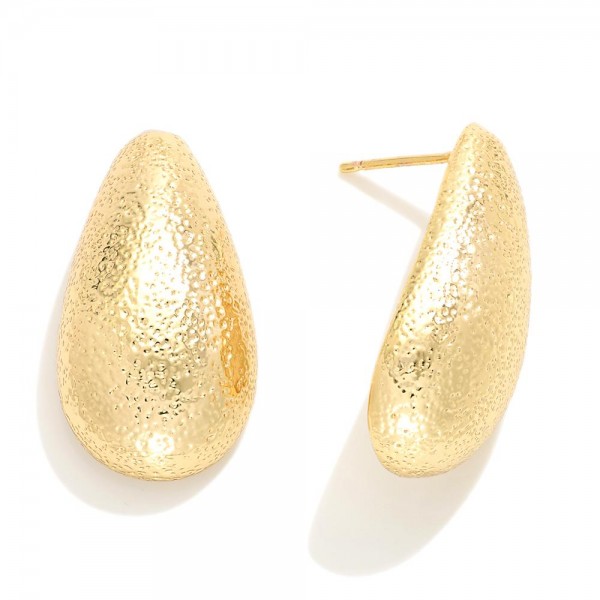 Do Everything In Love Textured Metal Teardrop Post Drop Earrings

- Brass Base
- Hypoallergenic
- White / 14K Gold Dipped
- Made In Korea
- Approximately 1" L