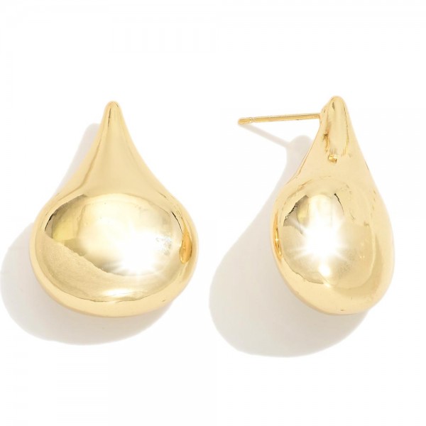 Do Everything In Love Metal Tone Teardrop Post Drop Earrings

- Brass Base
- Hypoallergenic
- White / 14K Gold Dipped
- Made In Korea
- Approximately 1" L