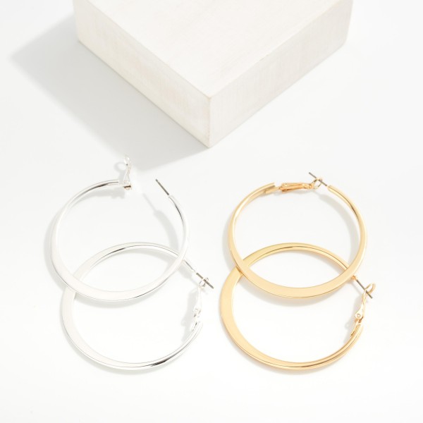 Pressed Tapered Metal Hoop Earrings
- Approximately 2" D