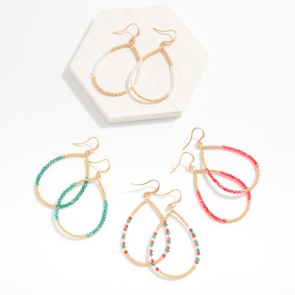 Beaded Teardrop Drop Earrings Featuring Gold Tones & Faceted Beads
- Approximately 2" L