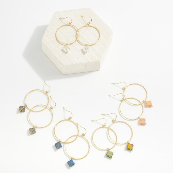 Hammered Metal Hoop Drop Earrings Featuring Translucent Clover Detail
- Approximately 2" L