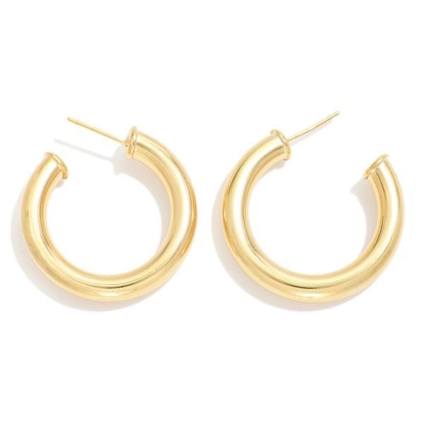 Chunky Hollow Metal Hoop Earrings

- Approximately 1.25" L
- 18k Gold Filled
- Hypoallergenic
- Made In Brazil