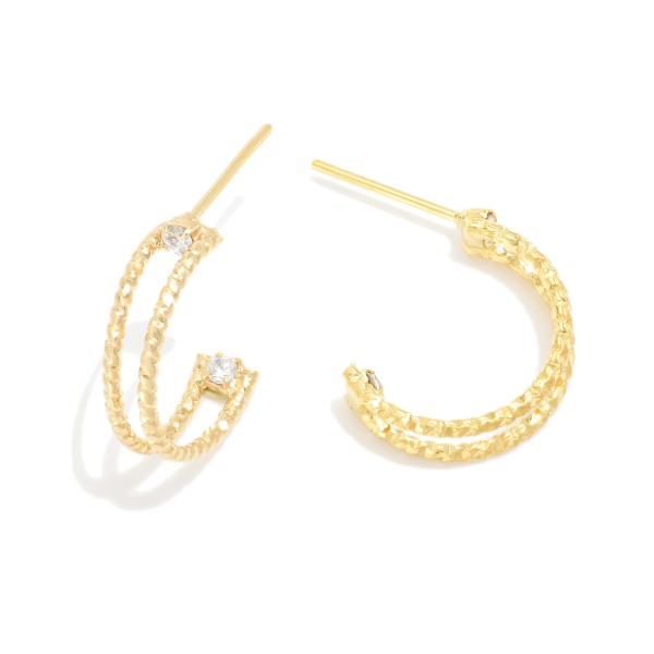 Shimmer Cut Metal Double Hoop Earrings

- Approximately 1.75" L
- 18k Gold Filled
- Hypoallergenic
- Made In Brazil