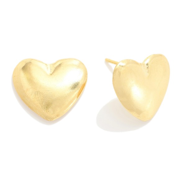 Metal Heart Post Earrings

- Approximately .5" L
- 18k Gold Filled
- Hypoallergenic
- Made In Brazil