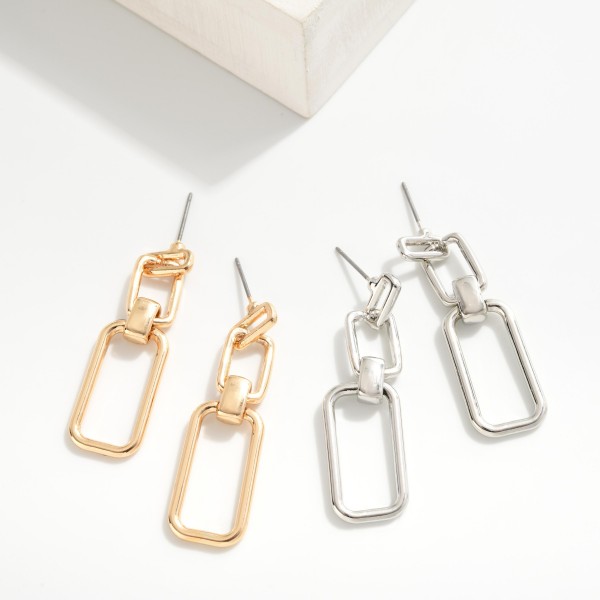 Metal Tone Linked Rectangle Drop Earrings
- Approximately 1.75" L