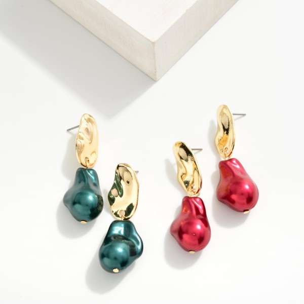 Linked Abstract Shape Post Drop Earrings Featuring Metal Tone Post
- Approximately 2" L