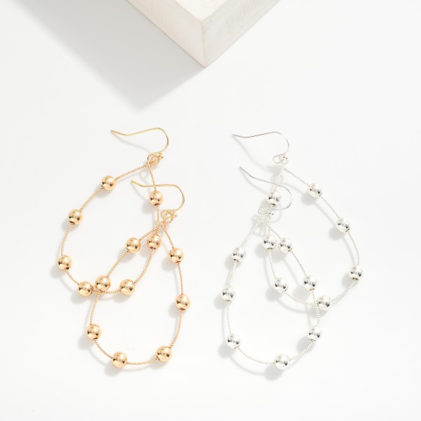 Textured Metal Wire Teardrop Drop Earrings Featuring Metal Tone Bead Accents 
- Approximately 2" L