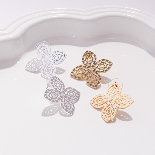 Metal Tone Clover Post Drop Earrings Featuring Cut Out Details
- Approximately 1" L