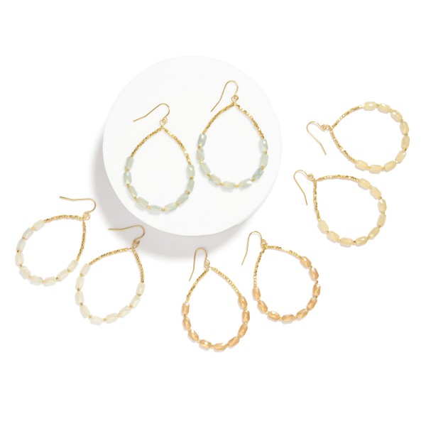 Beaded Teardrop Earrings Featuring Metal Tones & Faceted Beads
- Approximately 2" L