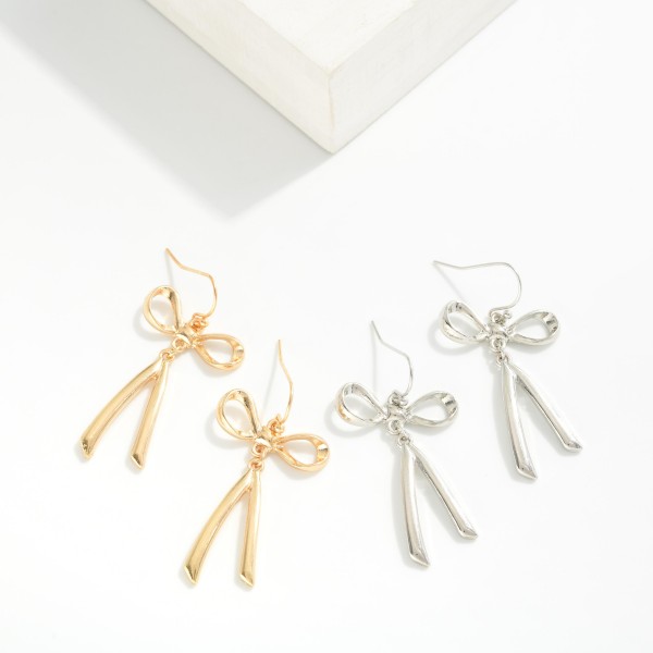 Metal Tone Linked Bow Drop Earrings 
- Approximately 1.5" L