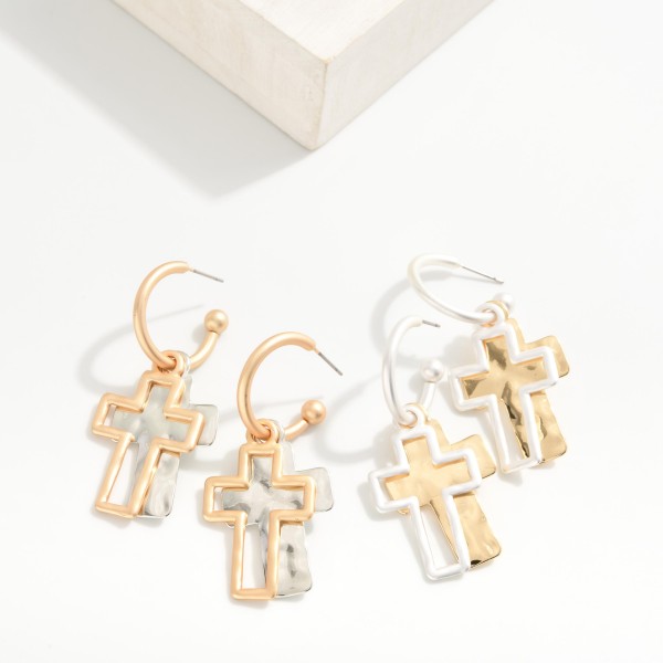 Metal Tone Hoop Earrings Featuring Hammered Metal Cross Dangle 
- Approximately 2" L