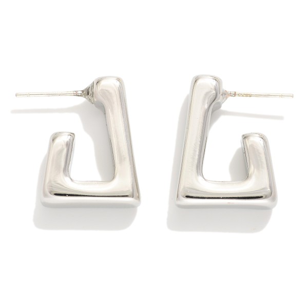 Metal Tone Rectangular Hoop Earring

- Approximately .75" L
-18k Gold Dipped 
- Sterling Silver Post 
