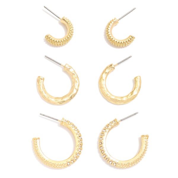 Set Of Three Textured Gold Tone Hoop Earrings Featuring Rhinestone Accents

- Approximately .25-.75" D