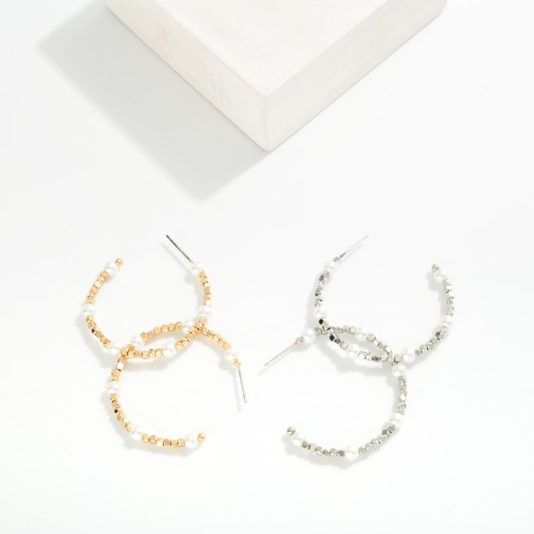 Metal Tone Geometric Shape Bead Beaded Hoop Drop Earrings Featuring Pearl Detail

- Approximately 1.25" L

