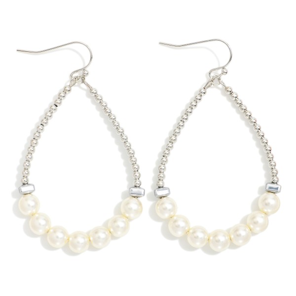 Metal Tone Bead Beaded Teardrop Earrings Featuring Pearl Detail

- Approximately 2" L

