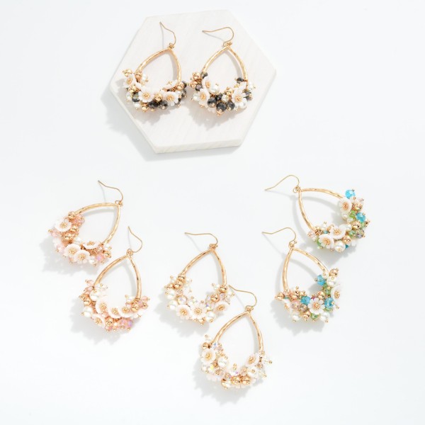 Hammered Metal Teardrop Drop Earrings Featuring Flower, Pearl, & Faceted Bead Cluster

- Approximately 2.5" L 