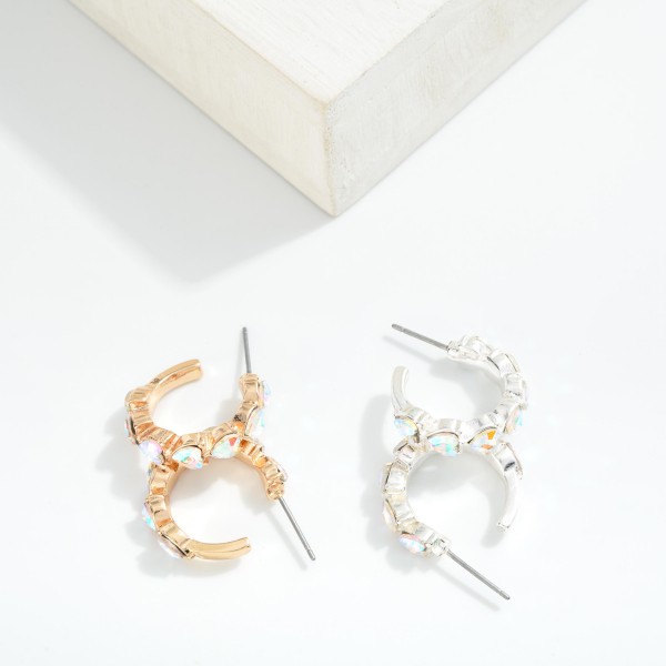 Metal Tone Hoop Drop Earring Featuring Studded Heart Shaped Rhinestones 

- Approximately .75" D 