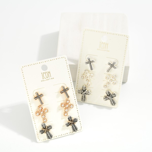 Set Of Three Textured Metal Cross Post Drop Earrings Featuring Pearl Details
- Approximately .75" L