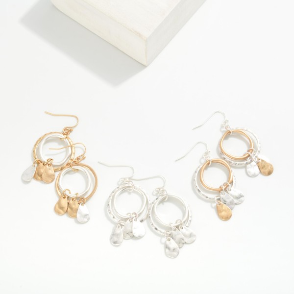 Nesting Hammered Metal Hoops Drop Earrings Featuring Teardrop Tassel Details 

- Approximately 2" L