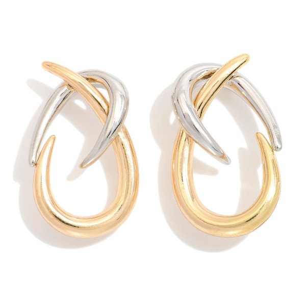 Metal Tone Twisted Hoops With A Modern Sculptural Design 

 - Approximately 1.5" L