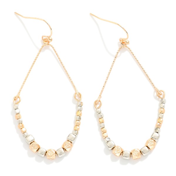 Metal Tone Teardrop Drop Earrings Featuring Geometric Shape Bead Details

- Approximately 2" L