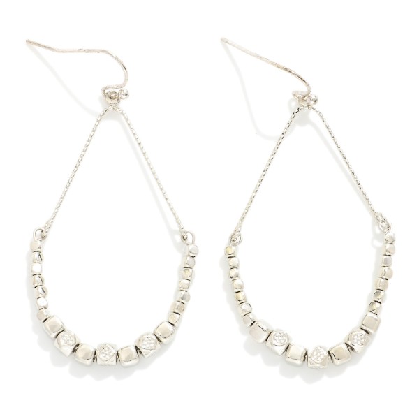 Metal Tone Teardrop Drop Earrings Featuring Geometric Shape Bead Details

- Approximately 2" L