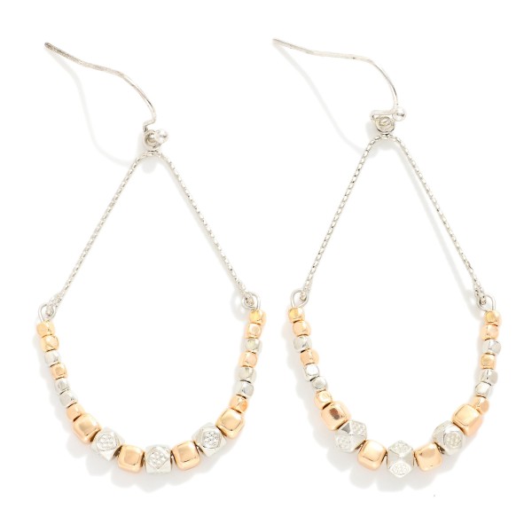 Metal Tone Teardrop Drop Earrings Featuring Geometric Shape Bead Details

- Approximately 2" L