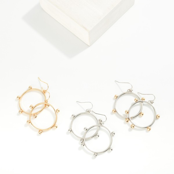 Drop Hoop Earrings Featuring Metal Tone Ball Accents 
- Approximately 2" L