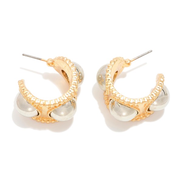 Chunky Metal Tone Hoop Earrings Featuring Dome Details 

- Approximately .75" D