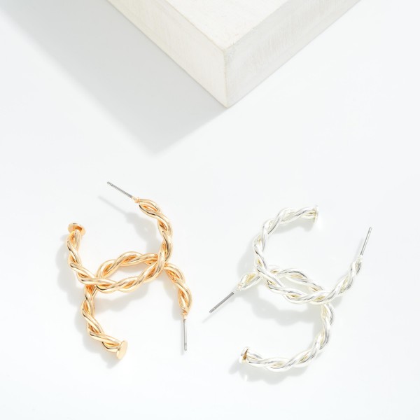 Twisted Metal Hoop Drop Earring 
 
- Approximately 1." L

