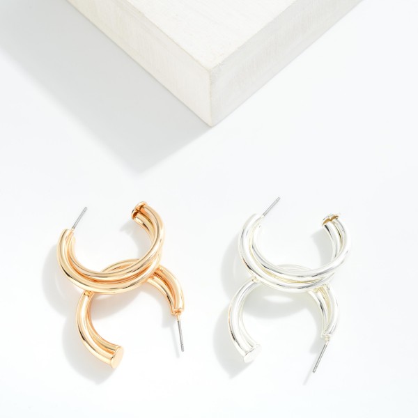 Metal Tone Intertwined Hoop Earrings 

- Approximately 1" D